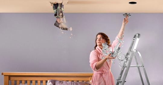 man falling through roof